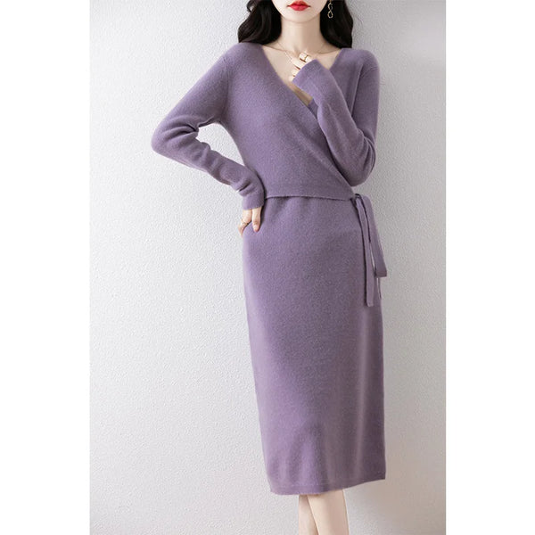 Purple dress with a belt on a white background