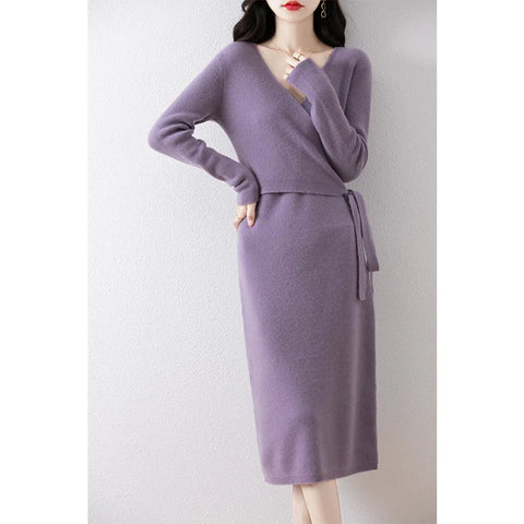 Purple dress with a belt on a white background