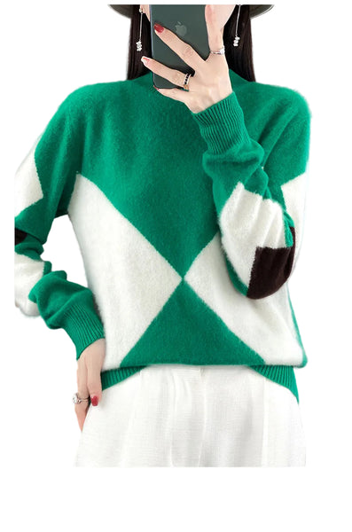 Green and white diamond patterned sweater worn by a person.