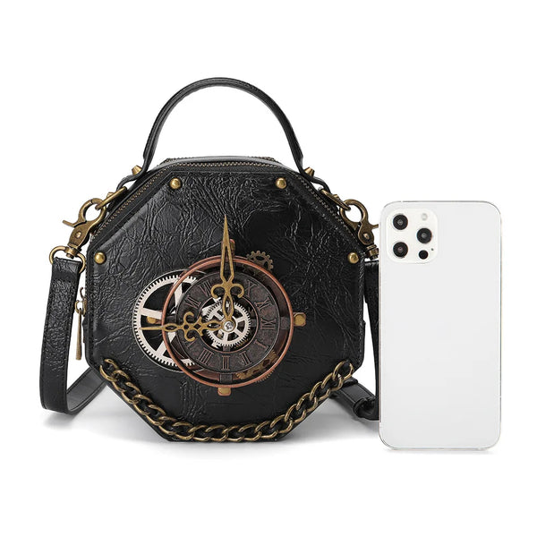 Retro-Punk Gothic Steampunk Clock Bag with a cellphone next to it, to show that this is a mini bag, just a few inches higher than a cell phone. The is hexagonal with clock hands. It's 7 inches x 3 x 7