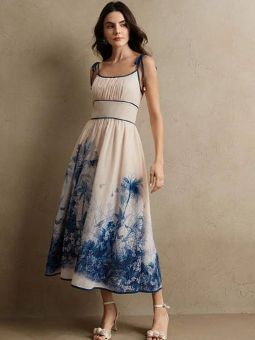 Woman wearing a floral dress with a neutral background
