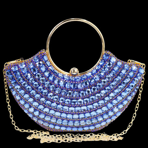 Blue beaded handbag with gold accents on a white surface, branded 'Venus Chan'.